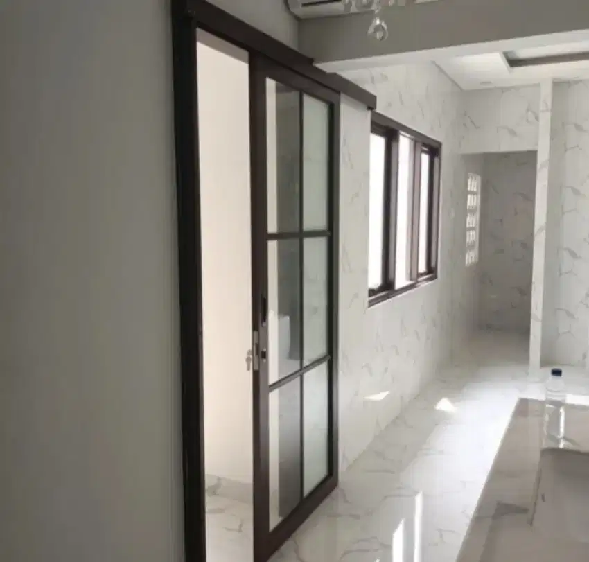 Pintu sliding ornamen aluminium