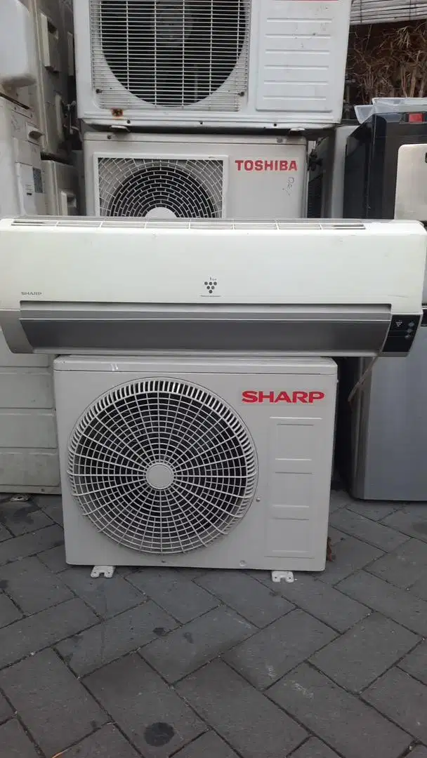 AC 1/2 PK sahrp harga plus pasang garansi 6 bulan dingin istimewa