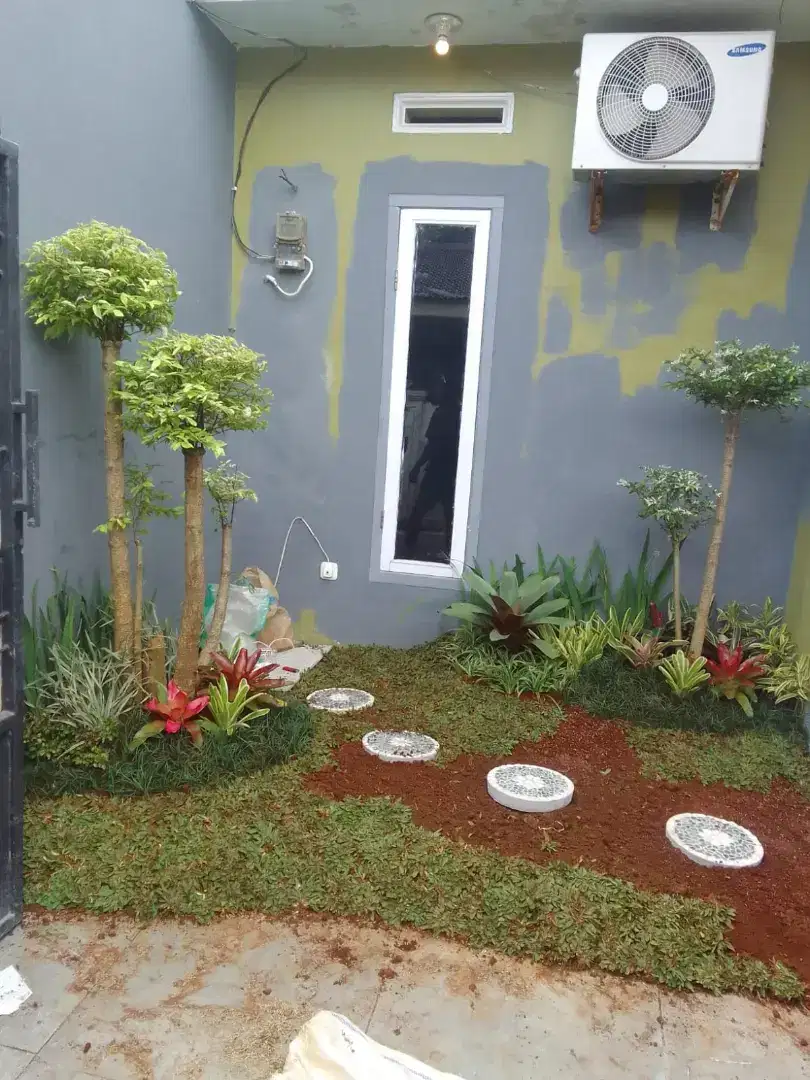 Tukang taman minimalis plus batu pijakan