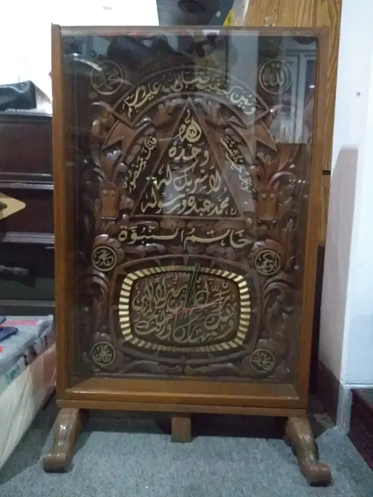 Jam kayu kaligrafi ukuran 72x45cm