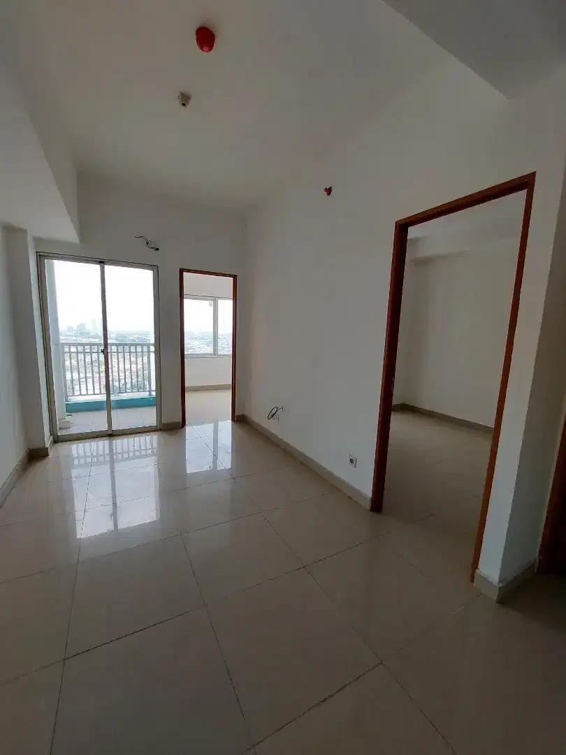 Disewakan Cepat 2BR Unfurnish tahunan Apartement The Nest