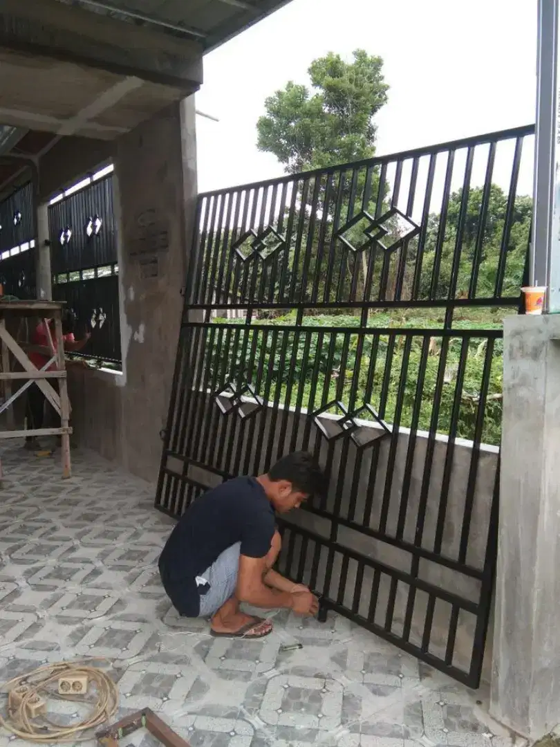 Pagar garasi grc rumah
