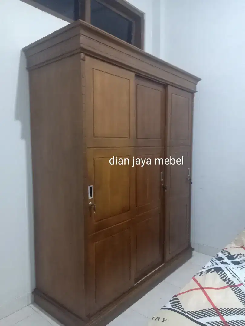 Lemari jati sliding 3 pintu