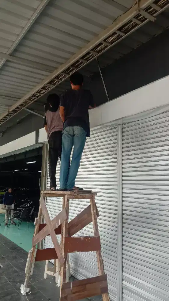 Tukang perbaikan folding gate dan rolling door
