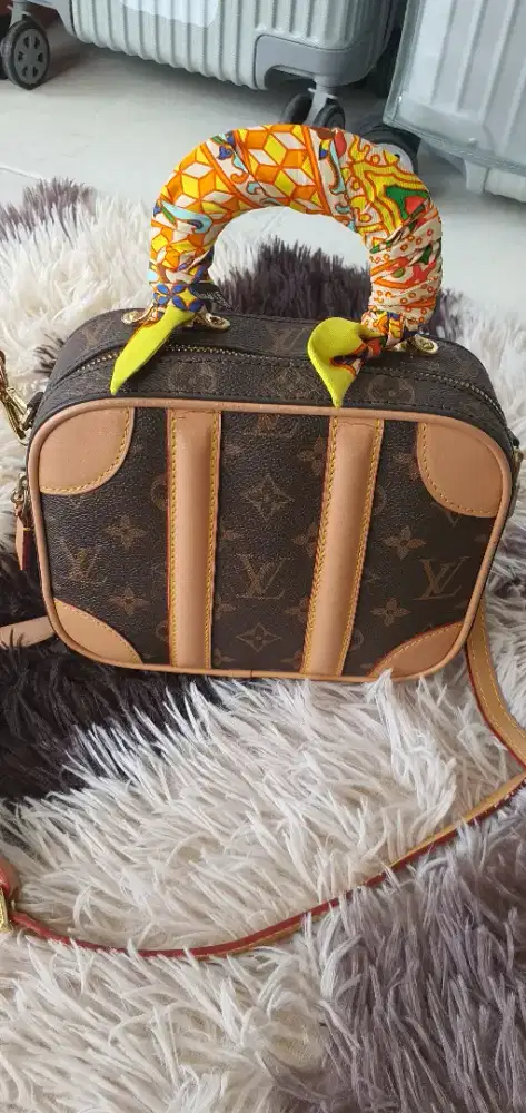 Louis vuitton camera tas wanita