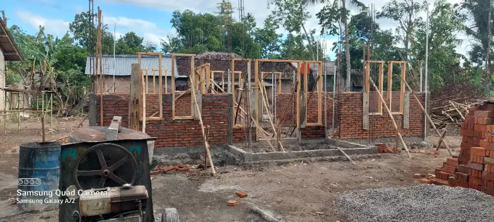 Tukang bangunan profesional