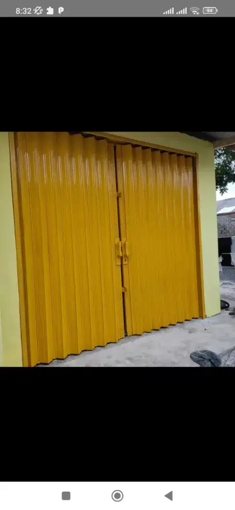 Folding gate roling door