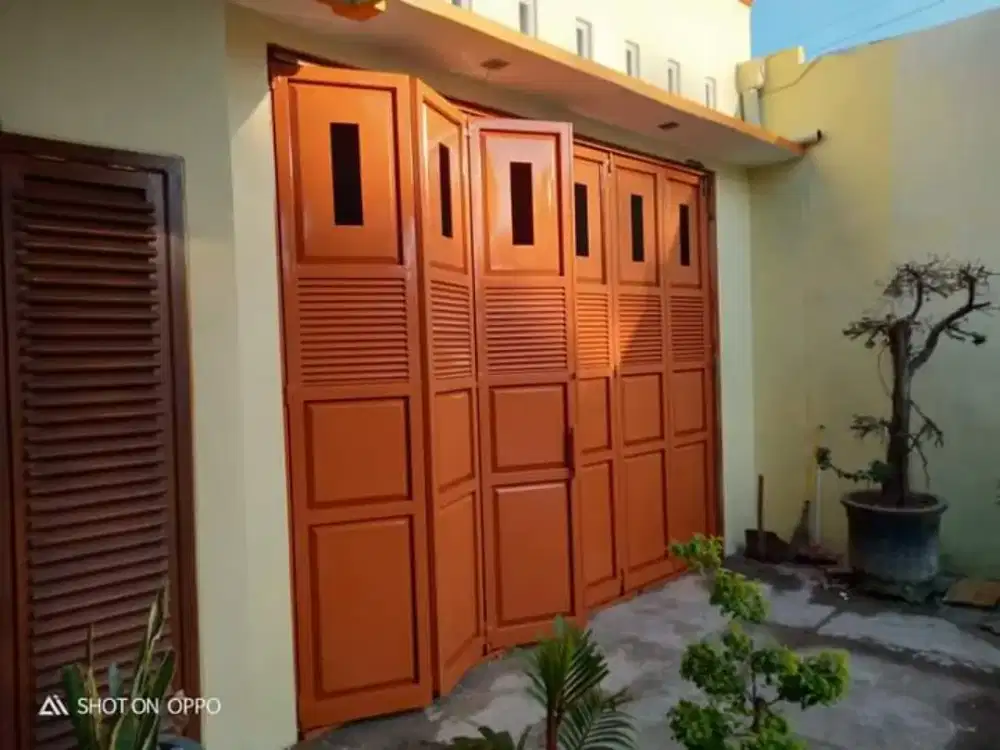 Pintu lipat sliding garasi