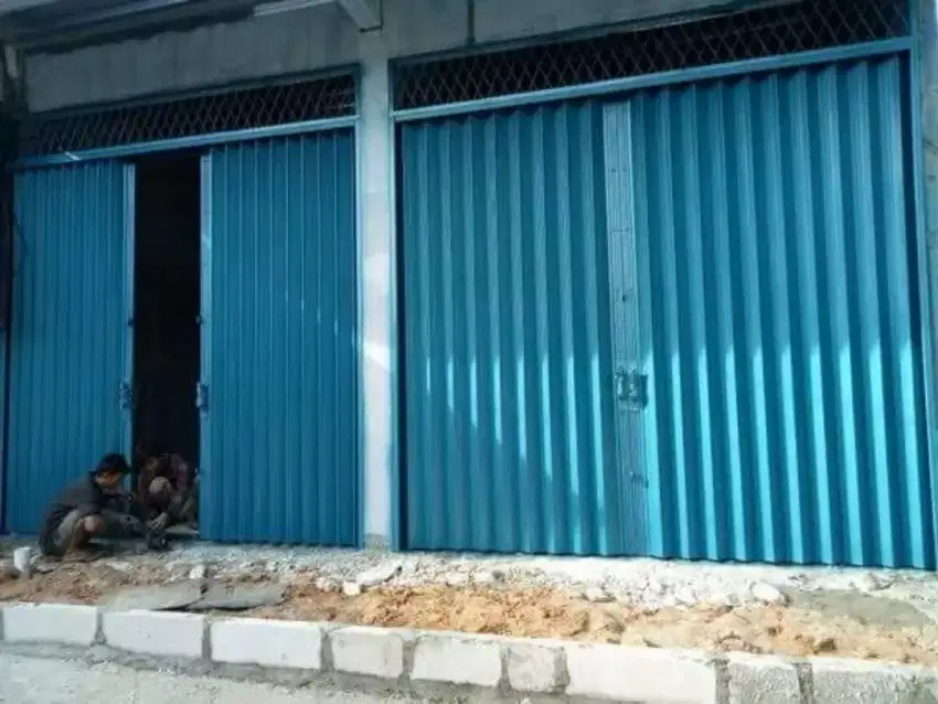 Roling door folding gate