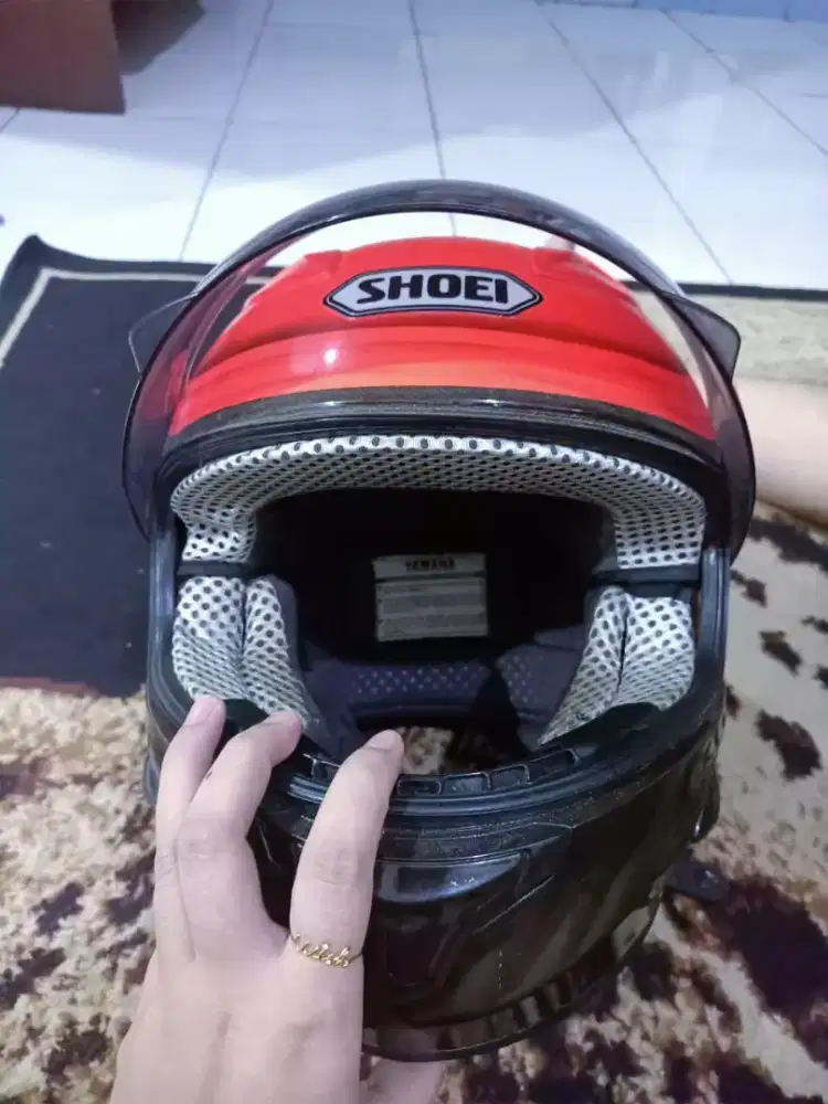 Harga helmet hot sale shoei original