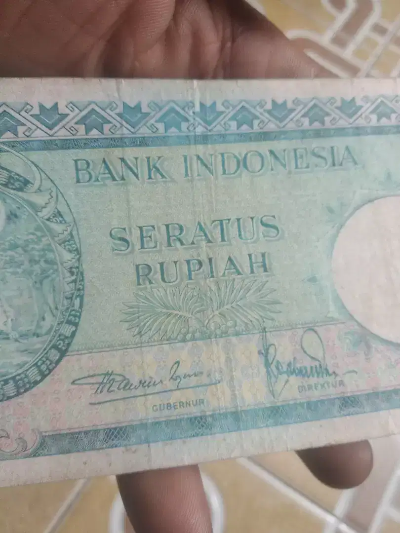 Uang kertas 100 tupai 1957