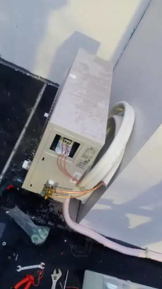 cuci AC .isi freon dan perbaikan AC