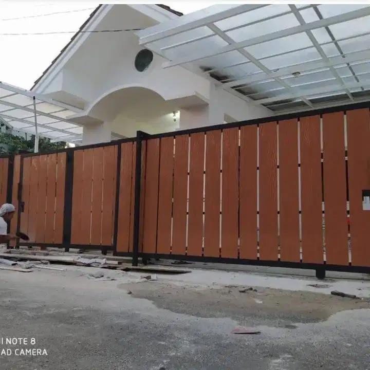 pagar grc motif kayu