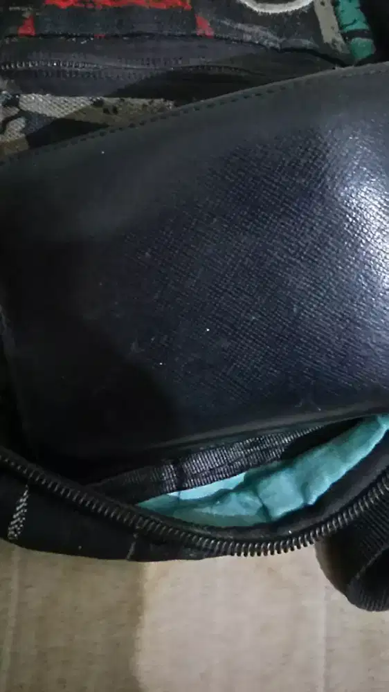 Uniqlo Tas & dompet oakley