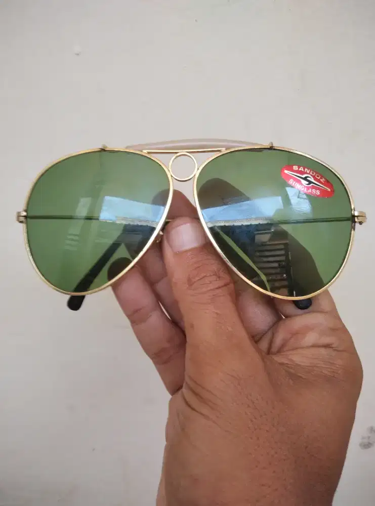 Kaca mata sandoz, lensa hijau