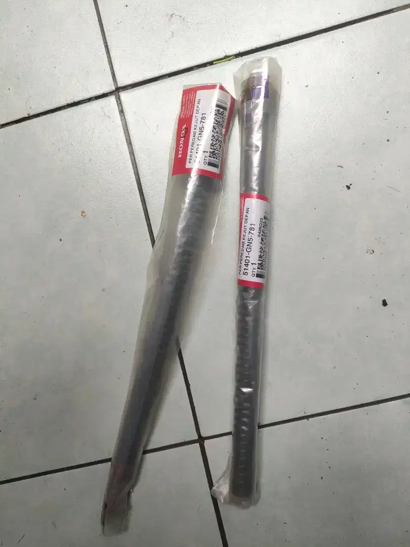 Per shock depan Honda Grand