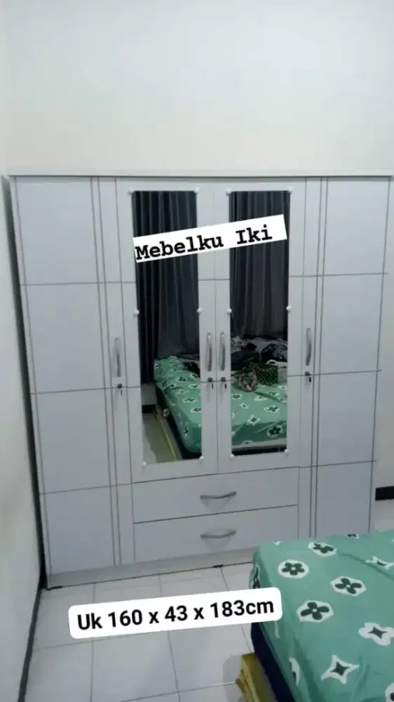 Lemari minimalis 4pintu Bpbtebal,putih cantik dan anggun bisa kirim