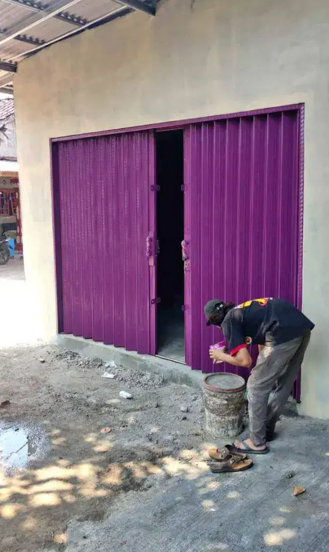 Folding gate rolling door