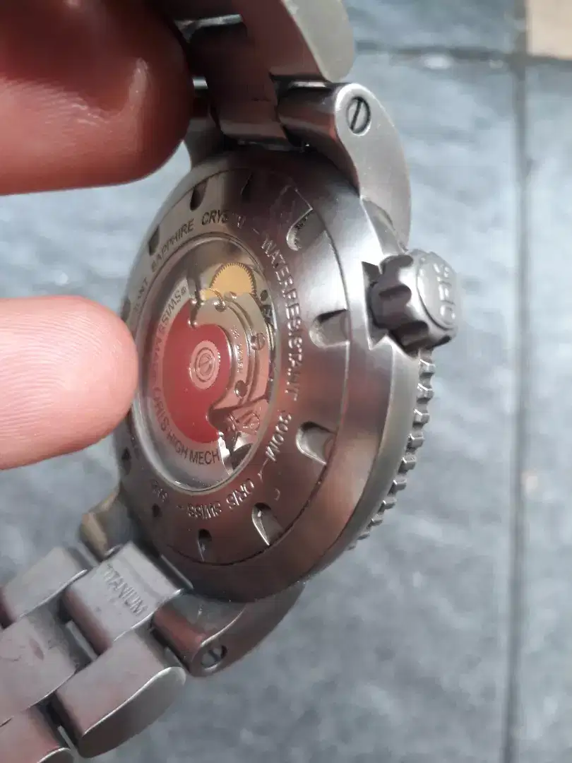Jam antik ORIS original titanium.masih berpungsi dengan baik.norm