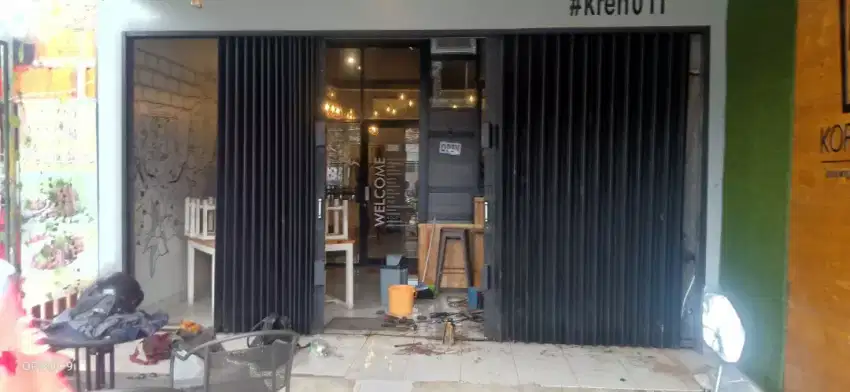 Konstruksi dan pembuatan Rolling door folding gate murah