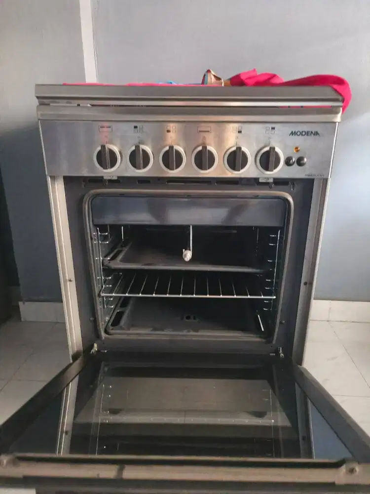 Kompor MODENA apik dengan minim pemakaian