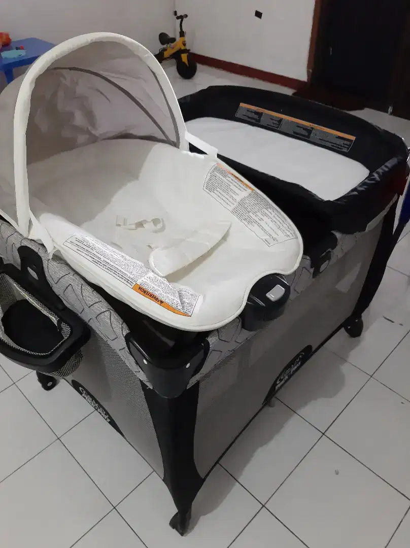 Box bayi Graco pack and playard quick connect