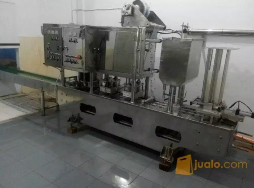 MESIN AIR MINUM DALAM KEMASAN (AMDK)