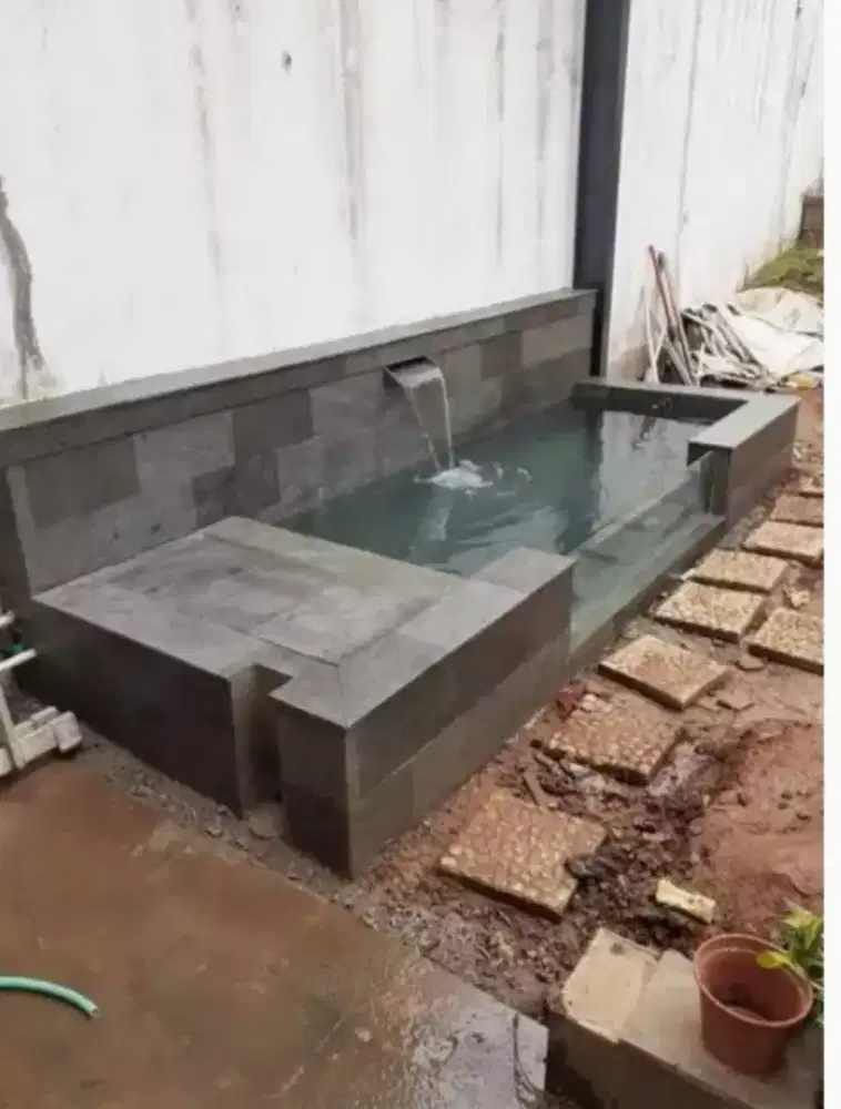 Kolam ikan minimalis dan taman