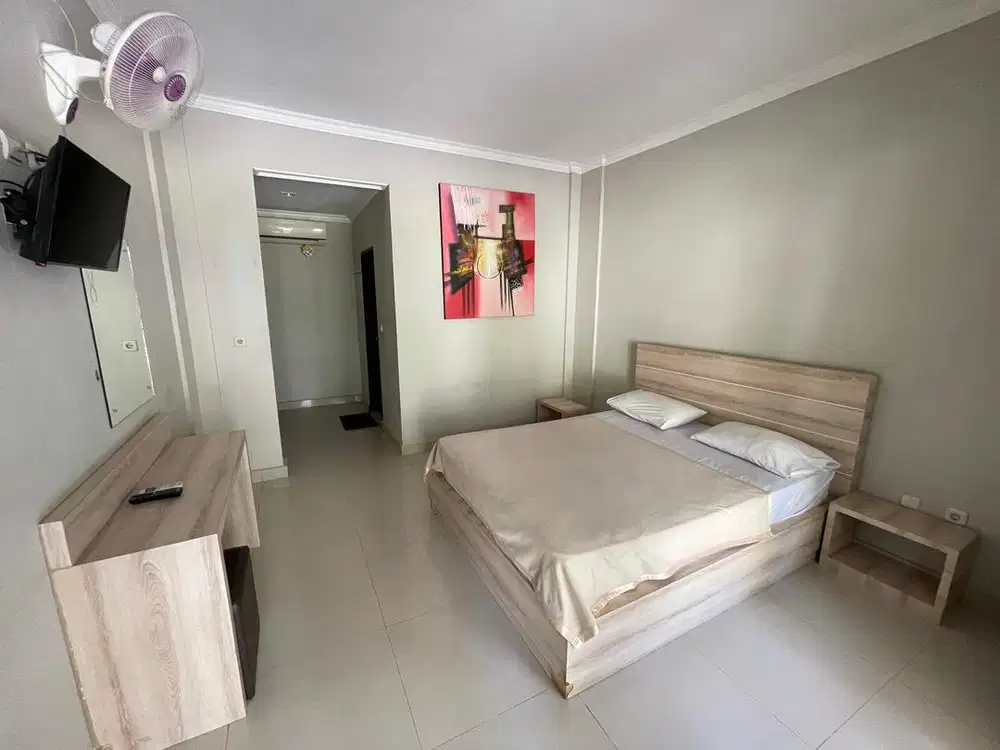 Kos Elit di Kuta Bali Dekat Beachwalk Fasilitas AC Kolam Renang Gym