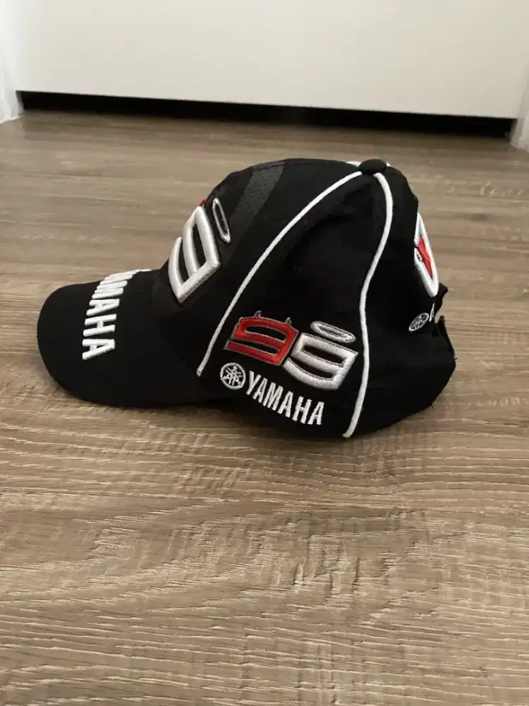 Uniqlo apparel topi yamaha x motogp. tag vr46