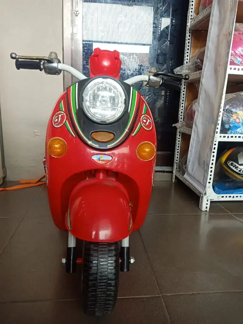 Sepeda listrik vespa anak