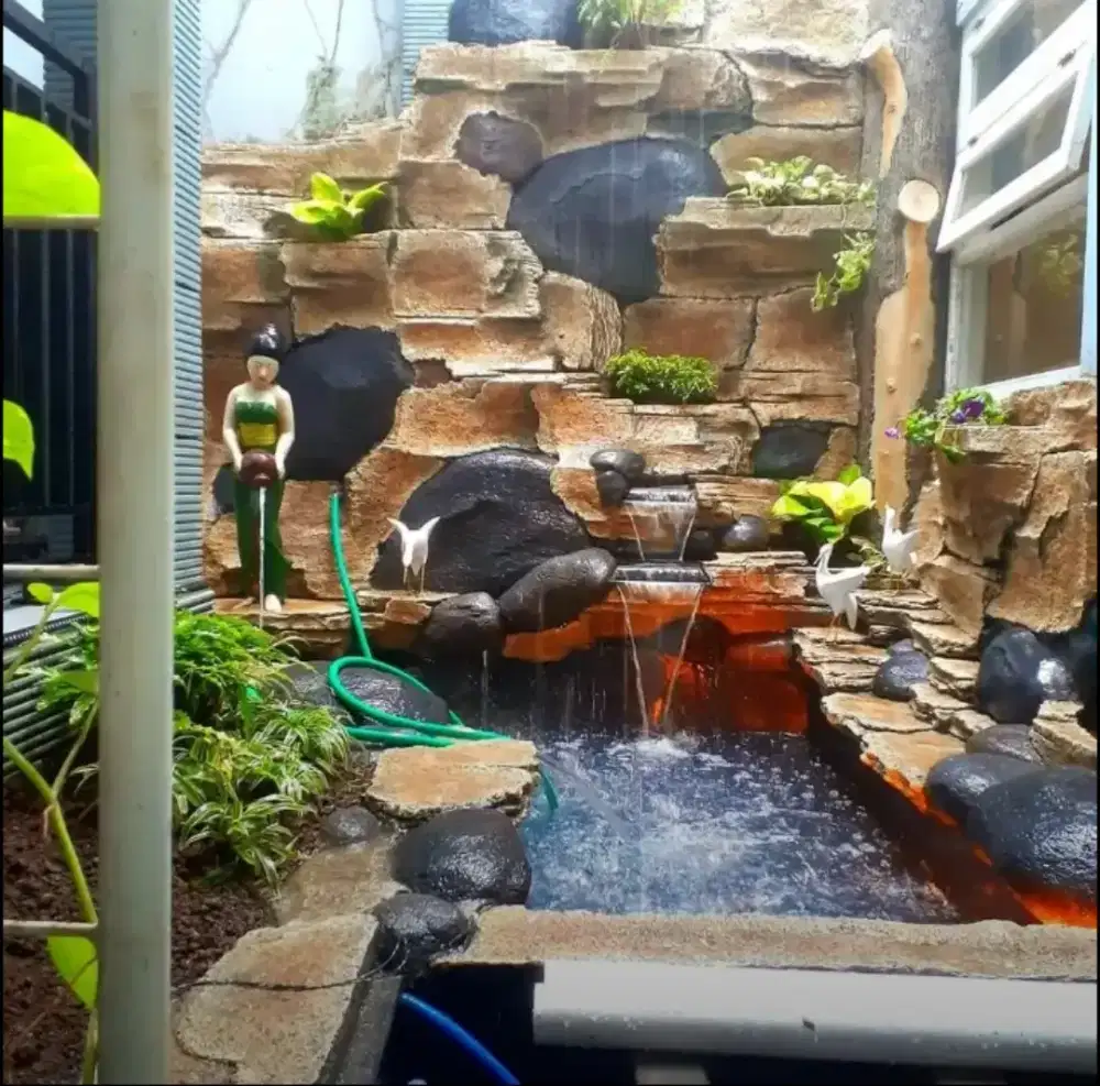 Kolam hias relief air terjun