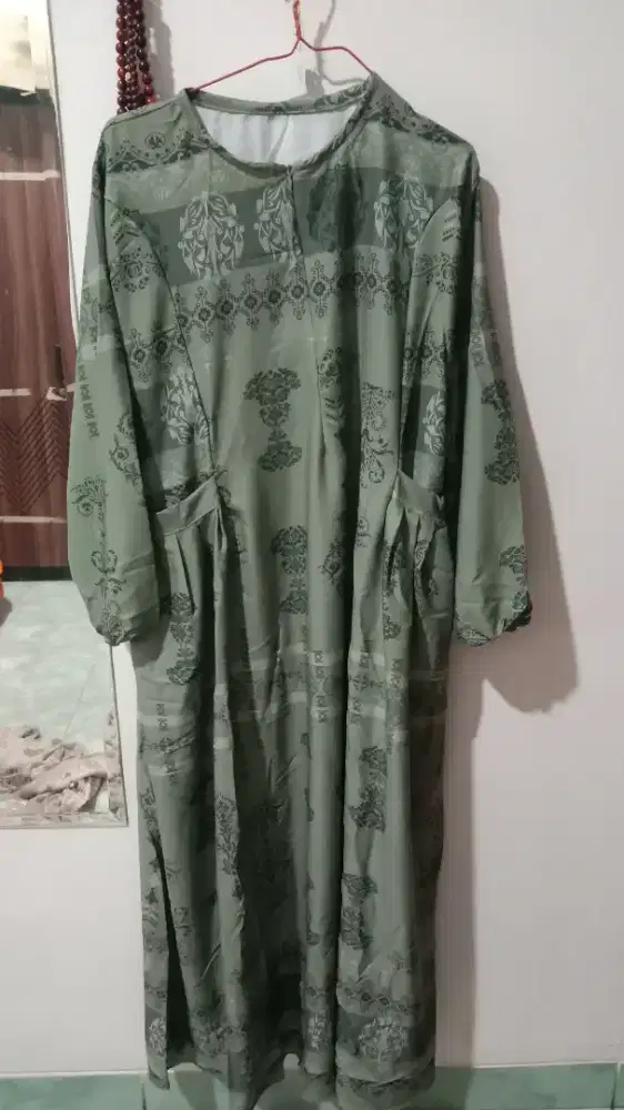Baju gamis premium tidak mudah lecek bahan adem jahitan rapih.