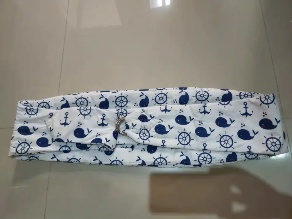 PL gendongan sling (samping)