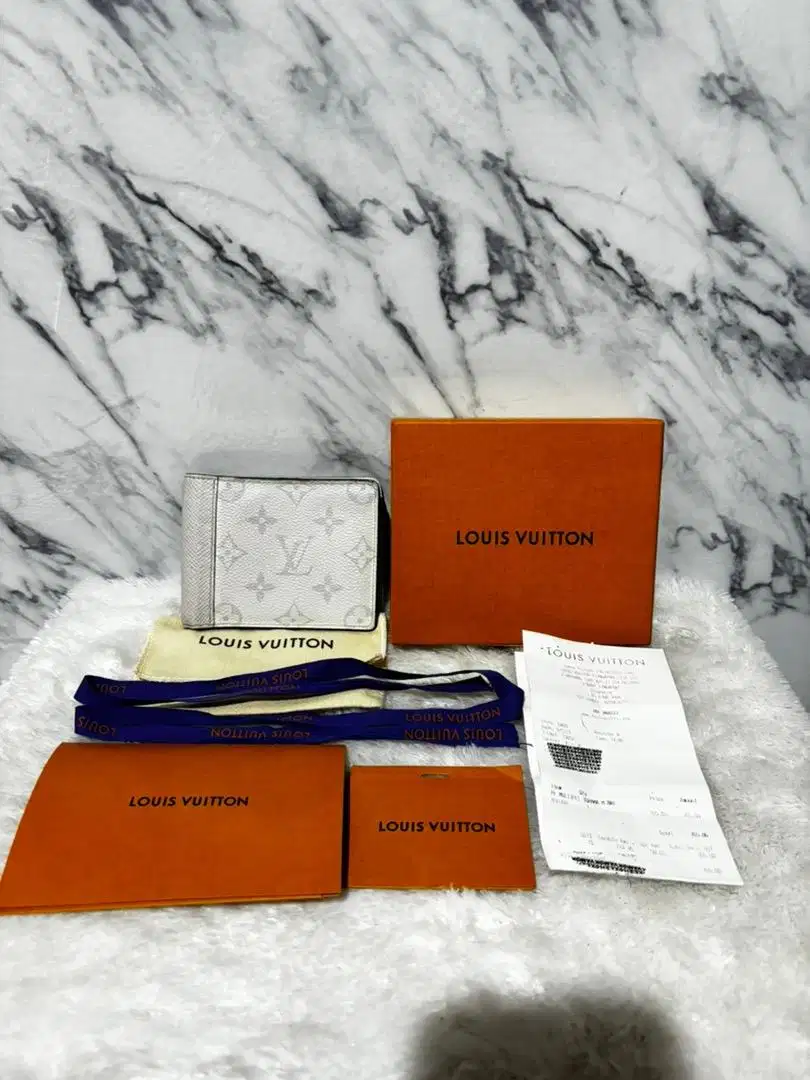 LOUIS VUITTON WALLET MULTIPLE TAIGARAMA MONOGRAM ANTARACTICA ORIGINAL