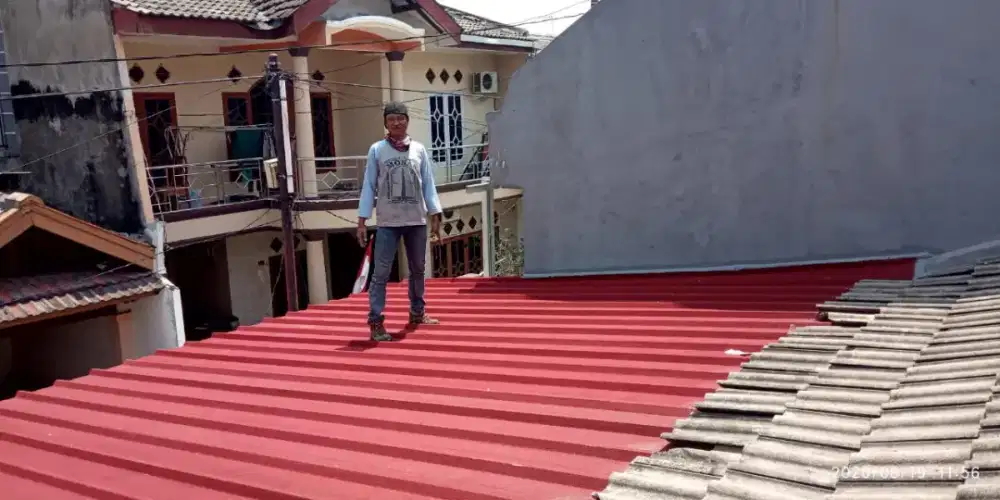 Ganti atap spandek pasir