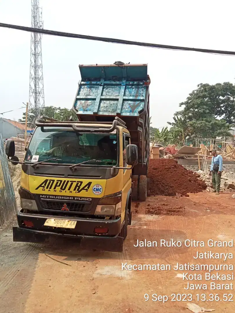 Puing tanah merah campur pengurugan urug buang puing sampah urugan