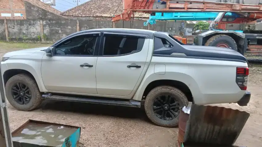 Tutup bak triton dan hilux carry boy