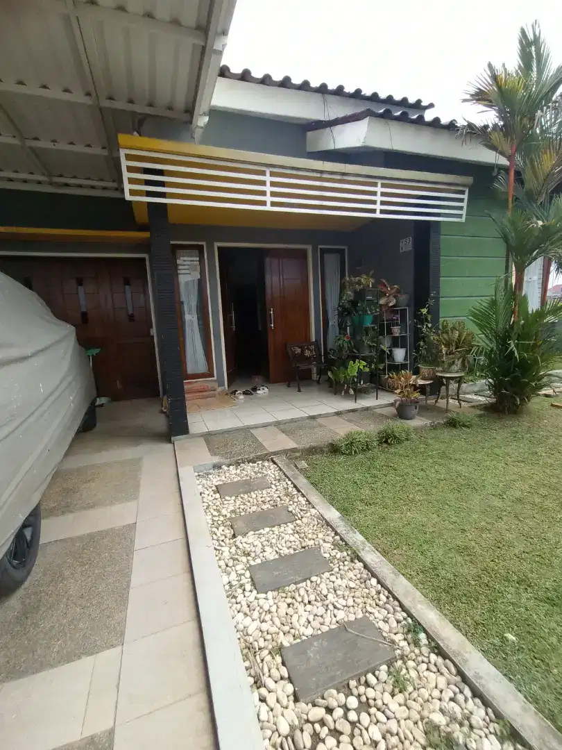 Djual rumah 2.3m lt450m nego model villa lokasi kalimulya depok