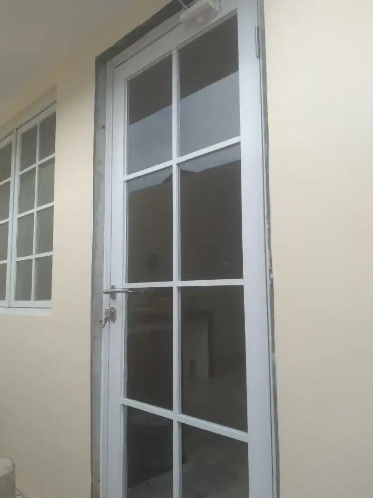 Pintu aluminium swing ornamen alexindo 215cm x 100cm hrg 2.350.000 COD