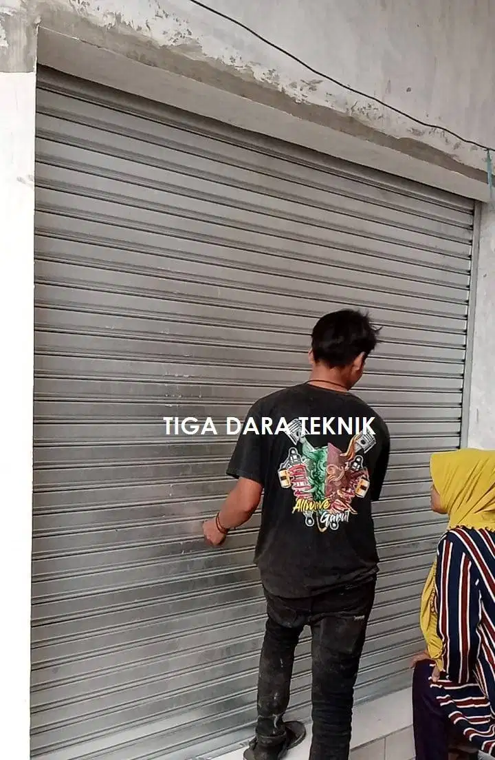 Pasang service rolling door murah di bandung, tiga dara teknik