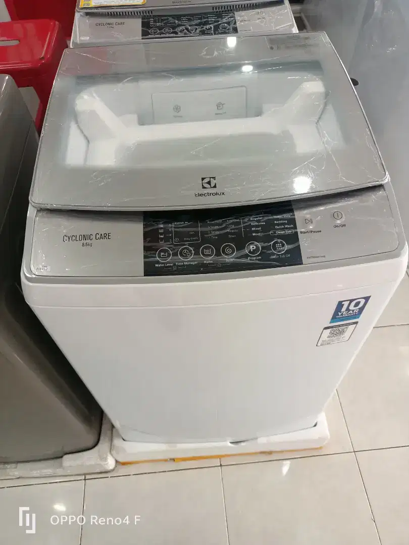 Mesin cuci top loading electrolux