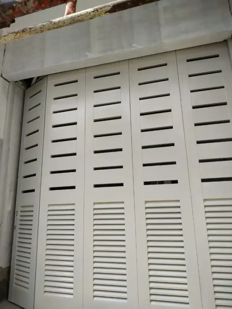 pintu garasi sleeding/tikung