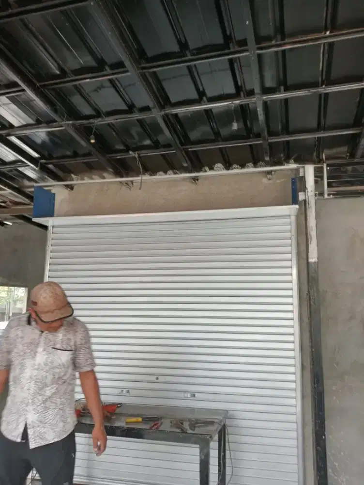 Rolling door follding gate