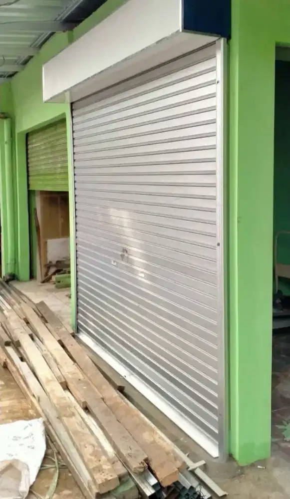 Rolling door follding gate