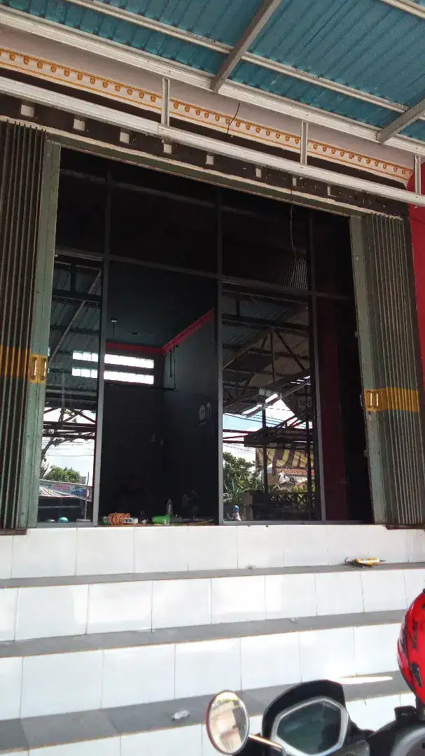 bikin partisi kaca almanium ,harga murah dan bungkar korsen