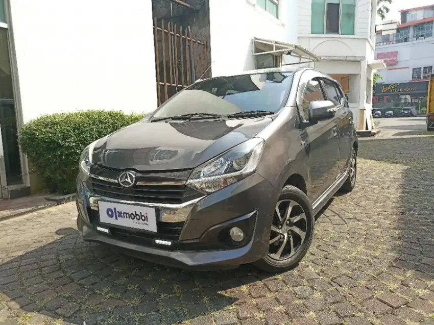 like new - DAIHATSU AYLA 1.2 R BENSIN M/T 2017 ABU-ABU