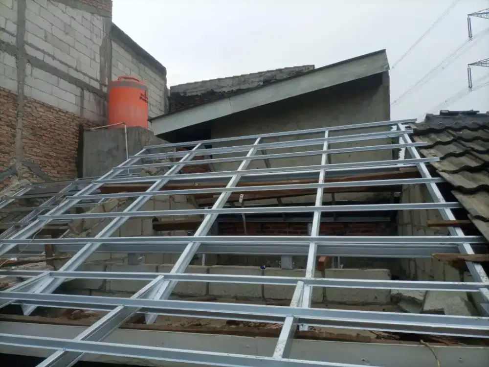 Renov rumah ganti atap bergaransi