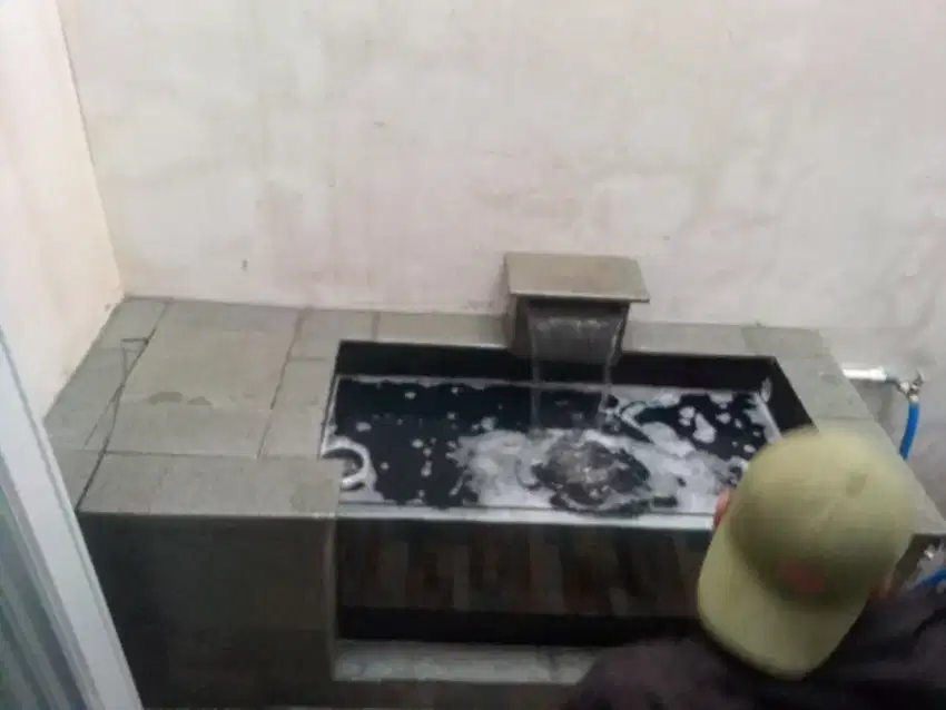 kolam kaca koi minimalis