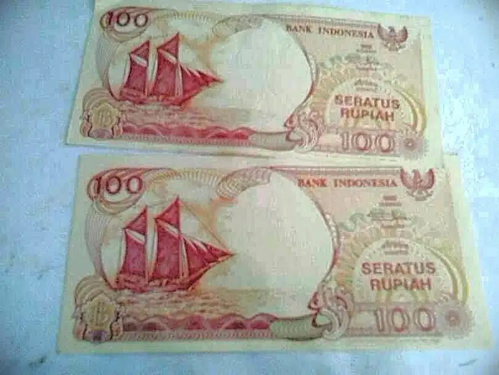 Uang Rp100 Kapal pinisi Mulus